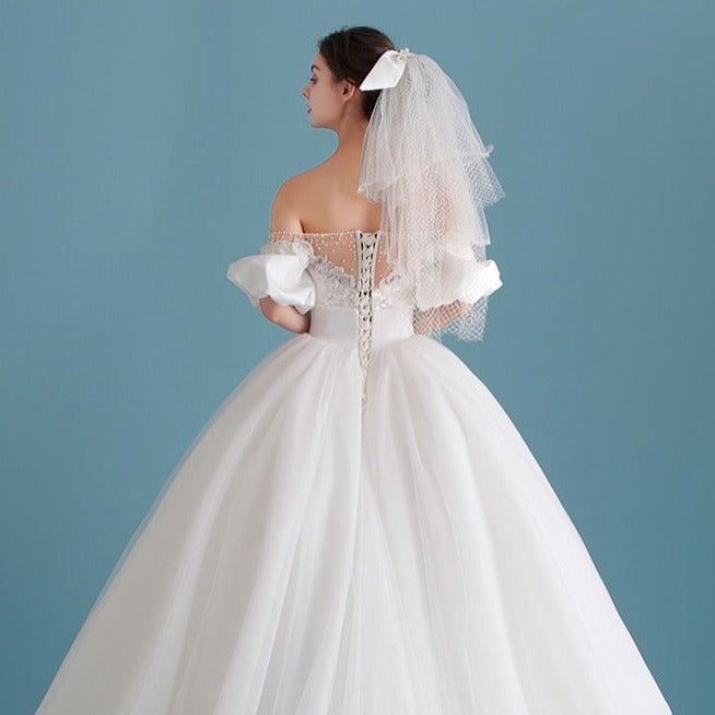Elegant Ivory Beaded Ball Gown Puff Sleeves Pearls Tulle Wedding Dress Vintage Wedding Dresses BlissGown 