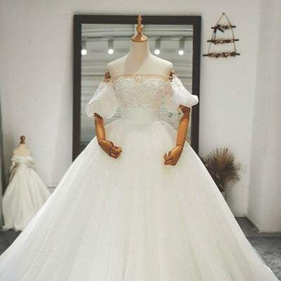 Elegant Ivory Beaded Ball Gown Puff Sleeves Pearls Tulle Wedding Dress Vintage Wedding Dresses BlissGown 