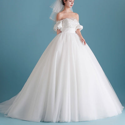 Elegant Ivory Beaded Ball Gown Puff Sleeves Pearls Tulle Wedding Dress