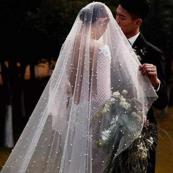 https://www.blissgown.com/cdn/shop/products/long-face-cover-cathedral-3-meters-pearl-veil-one-layer-bridal-veils-wedding-accessories-blissgown-169727_grande.jpg?v=1631491189