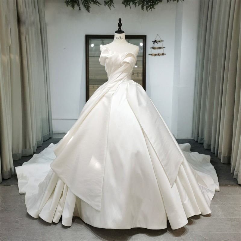 Luxury Satin Ball Gown Boat Neck Illusion Sleeveless Bridal Dress